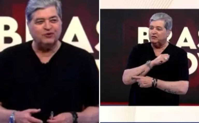 Datena esquece o terno, aparece de camiseta em ao vivo e revela tatuagens