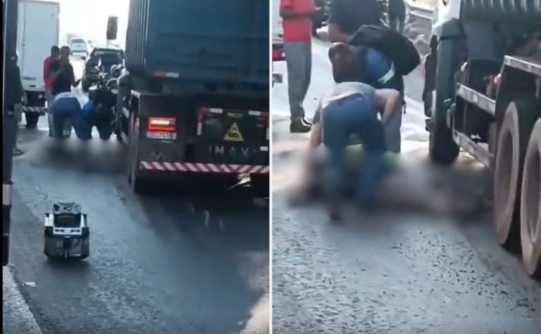 Motociclista vai parar embaixo de caminhão após acidente em Rodovia